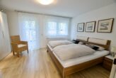 Reserviert, Erftstadt-Gymnich, Bungalow mit versetzten Wohnebenen, umfangreich modernisiert - Schlafzimmer 2, Untergeschoss